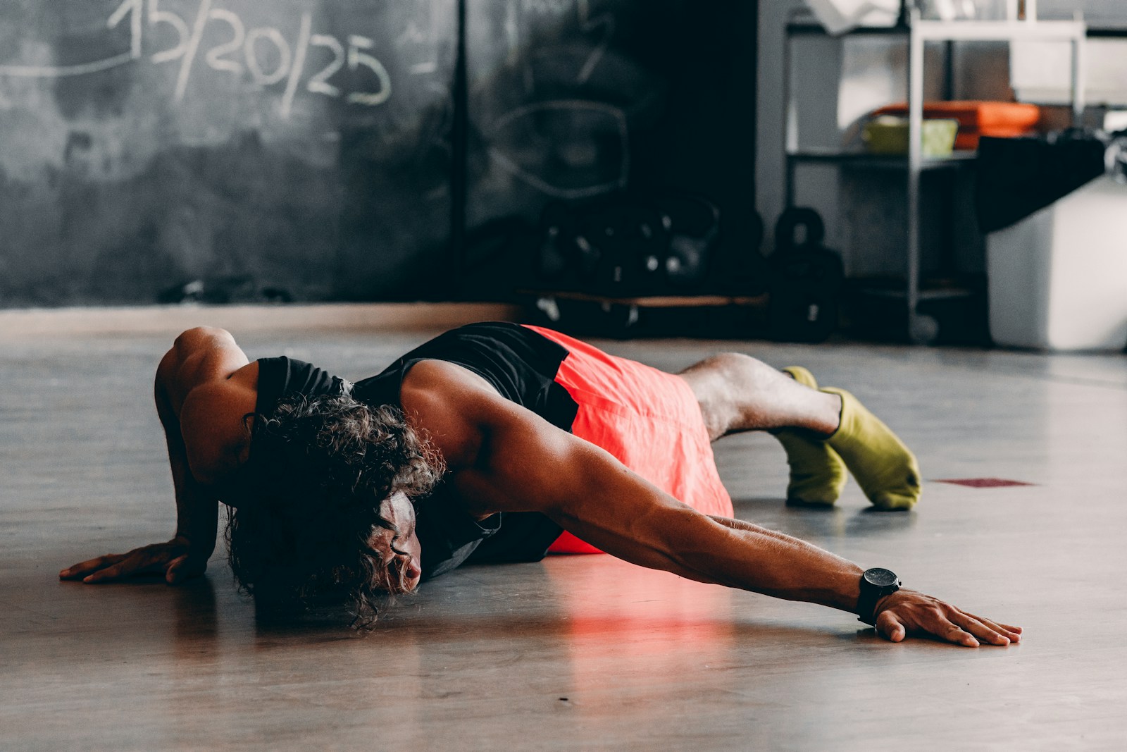 a man is doing push ups on the floor